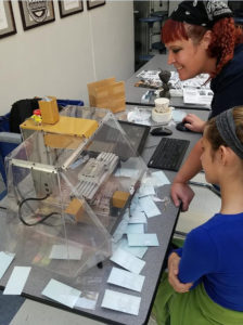 Jenny with a student during the STEM event. 